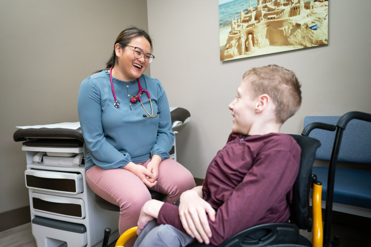 Sarah Tang, MD with a patient at Canyon View Medical Pediatrics